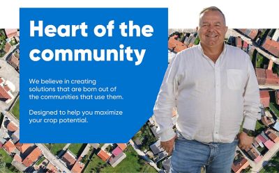 .Person with branded imagery and embedded text - Heart of the Community