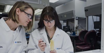researchers in a lab