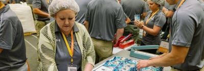 Corteva workers assembling packages