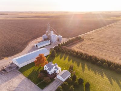 Aerial view of farm land harvested in IA