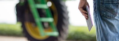 Man with Ipad in foreground