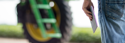 Man with Ipad in foreground