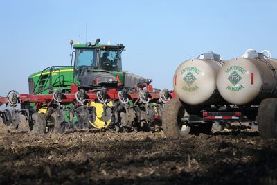 Green tractor with Anhydrous tanks