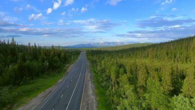 Two lane highway with mountains