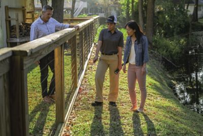 Sentricon AO with homeowners at fence
