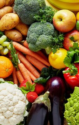 collection of many colorful fruits and vegetables viewed from above