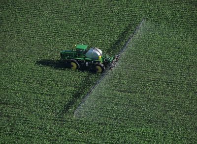 Aerial view of sprayer in field