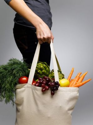 man holding grocery bag
