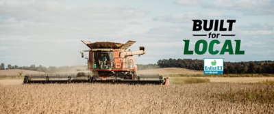 combine in soybean field