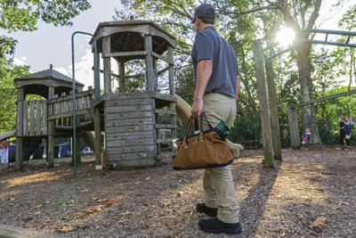 Certified Sentricon Specialist at a wooden playground