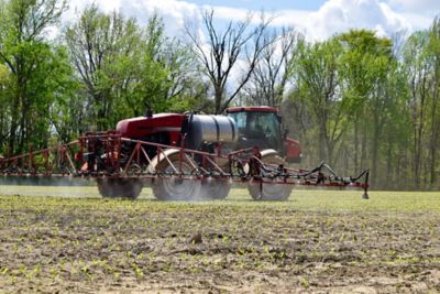 Sprayer in field early spring