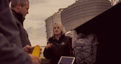 People at tailgate on farm