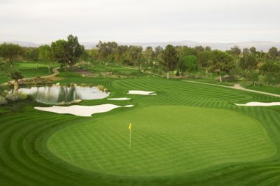 Drone view of golf course green and approach