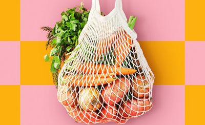 A bag of assorted vegetables hanging.
