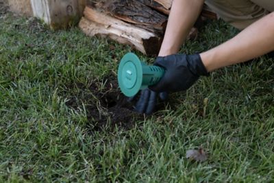 gloved hands installing a Sentricon in ground station