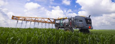 Sprayer in corn field