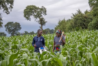 man and woman in crop field