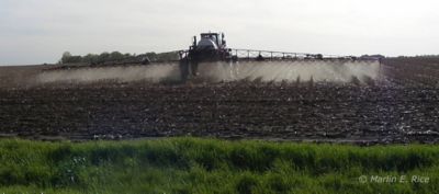 sprayer in field in spring