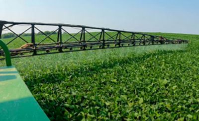 Soybean herbicides being sprayed on a field of Pioneer brand Enlist E3 soybeans