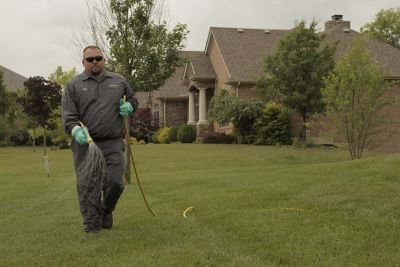 Lawn applicator in PPE