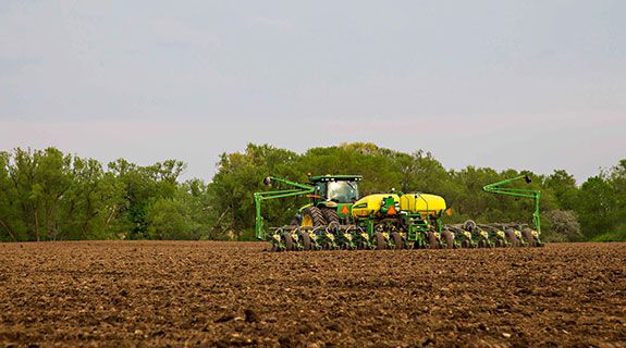 Planting operation - trees in background