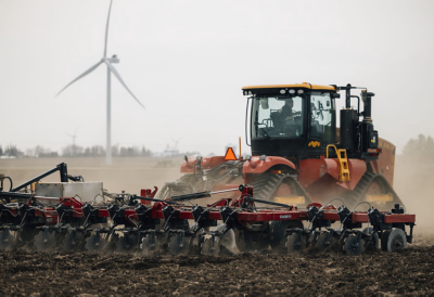 Red tractor discing