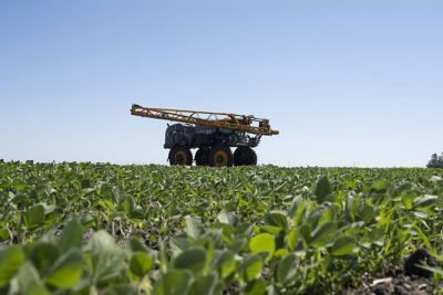 Sprayer in soybean field