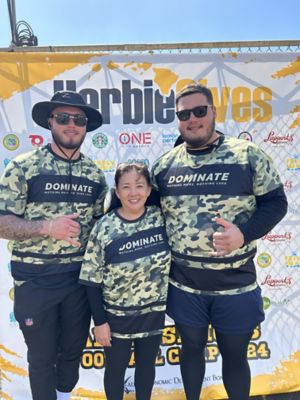 photo of two men and a woman in the Herbiegives event