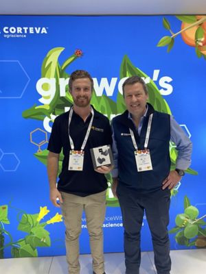 Daniel Schild (left) from Grange Garlic receiving his prize at the Corteva Agriscience trade display at Hort Connections from Chris Brown (right), Customer Technology Specialist from Corteva Agriscience