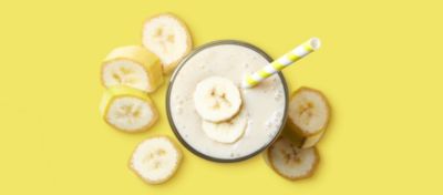 Banana Milkshake on Yellow Background
