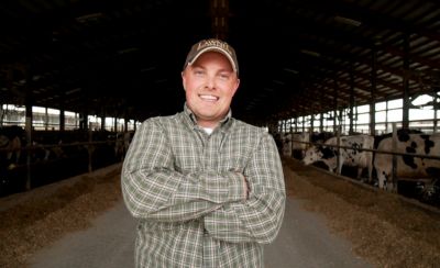 Man in dairy barn