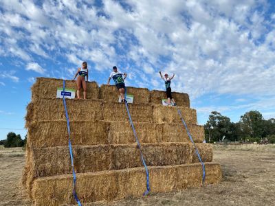 Amelia, Nick & Karen atop the hay mountain