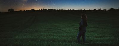 Lady standing in field