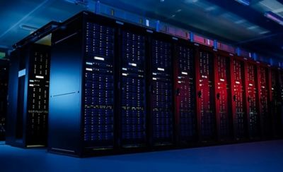 rows of computer data banks in dark room