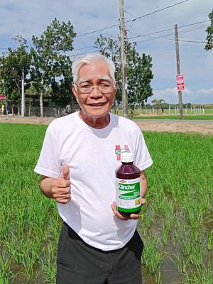 farmer holding Clincher 