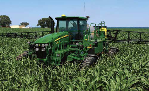 Application of foliar treatments that include a nonionic surfactant prior to tasseling has been associated with arrested ear development.