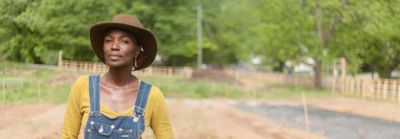 woman farmer in field of an urban farm