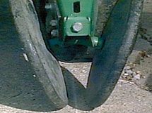 Photo - Closing wheels centered on row.