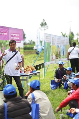 Scientist in Lab with Plants