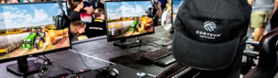 row of monitor-and-keyboard gaming stations