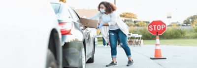 Woman helping in food line