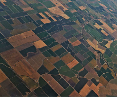 Overhead view of large area of farm fields demonstrating how crop protection enables abundant, sustainable food production