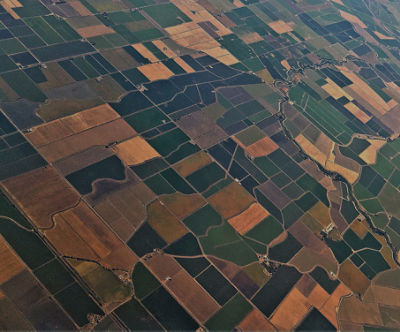 Overhead view of large area of farm fields demonstrating how crop protection enables abundant, sustainable food production
