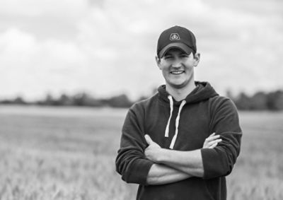 Andrew Campbell standing in field