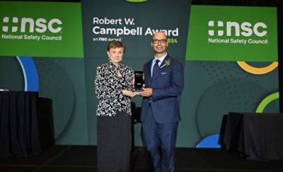 Corteva CEO Chuck Magro accepts the Robert W. Campbell Award