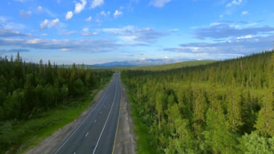 Two lane highway with mountains