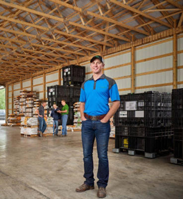 Photo - Pioneer rep standing in warehouse