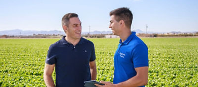 Jose-and-Farmer-Smiling-In-The-Field