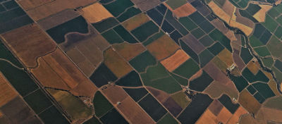 Overhead view of large area of farm fields demonstrating how crop protection enables abundant, sustainable food production