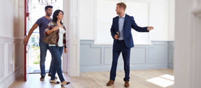 Home buyers viewing a house